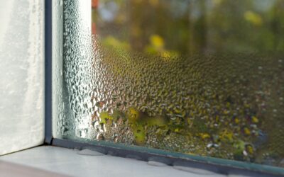 Closeup Of A Home’s Glass Window Blurred By Water Drops Collecting, Signaling The Need For Air Dehumidification.