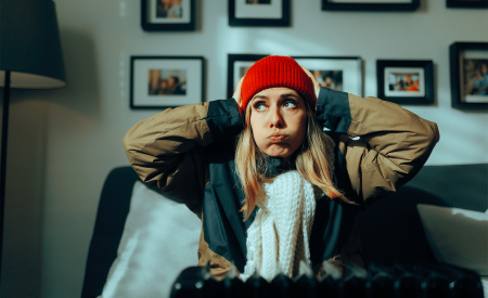 Millennial Homeowner experiencing HVAC trouble at home.