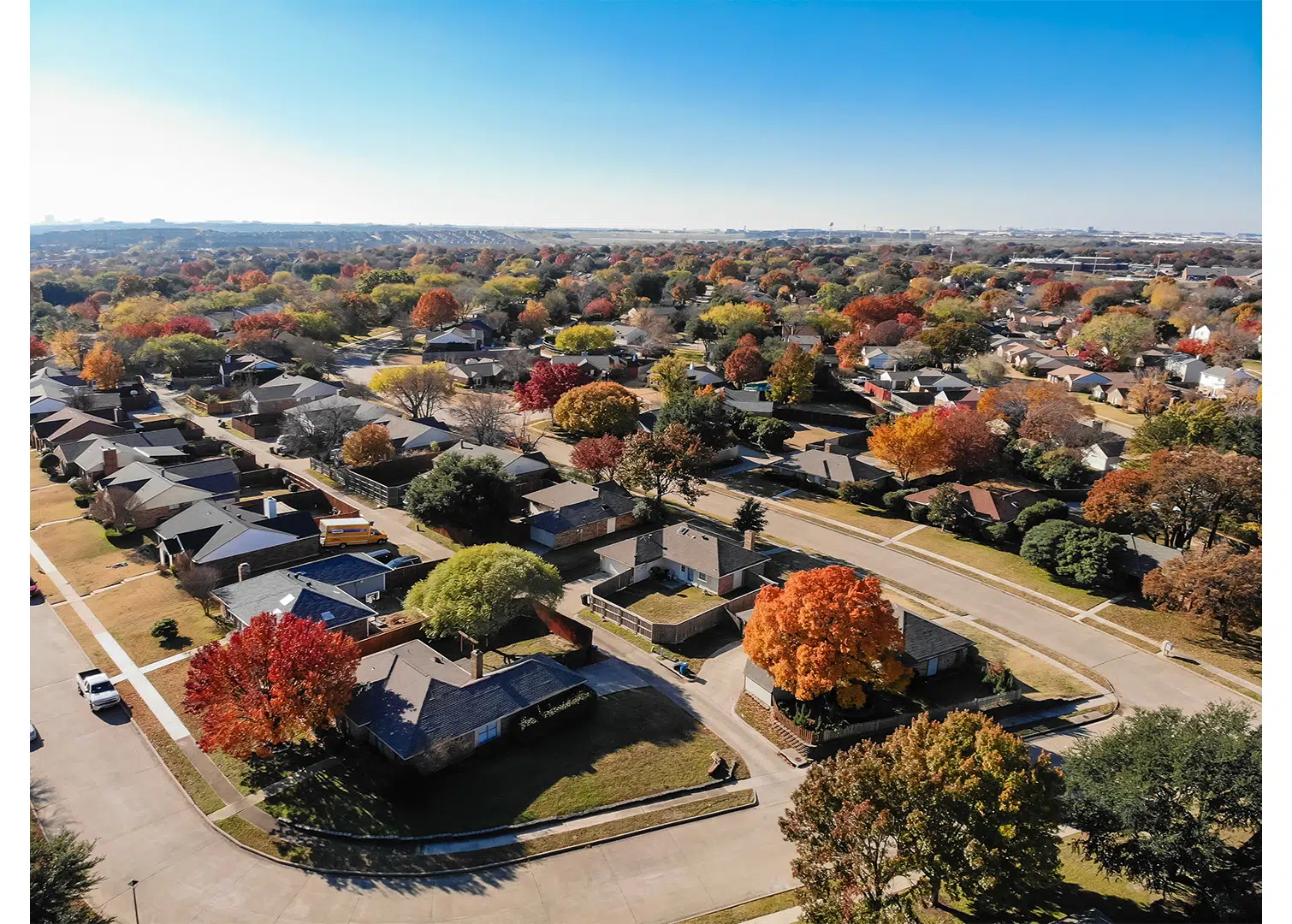 A drone image of a Dallas residential neighborhood in fall.