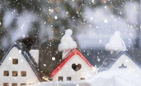 A series of porcelain house in a snowy winter theme.